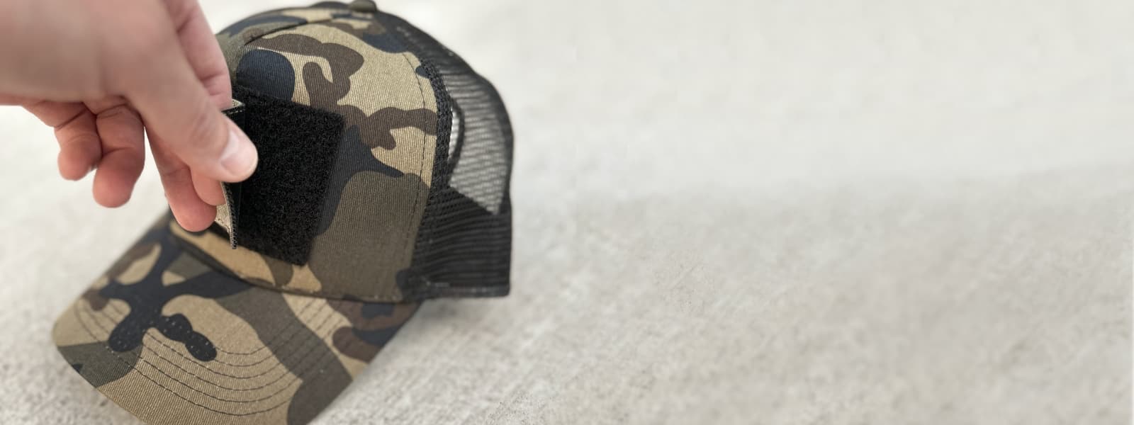 Removing a patch from the Blank Snapback Cap in camo colour